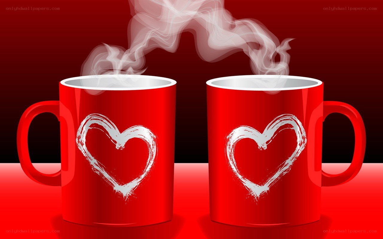 Two red mugs with hearts
