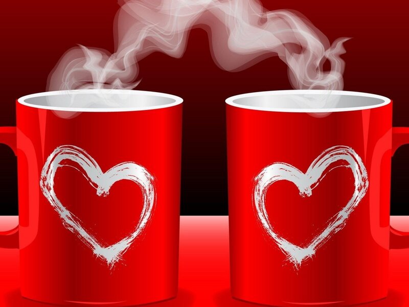 Two red mugs with hearts