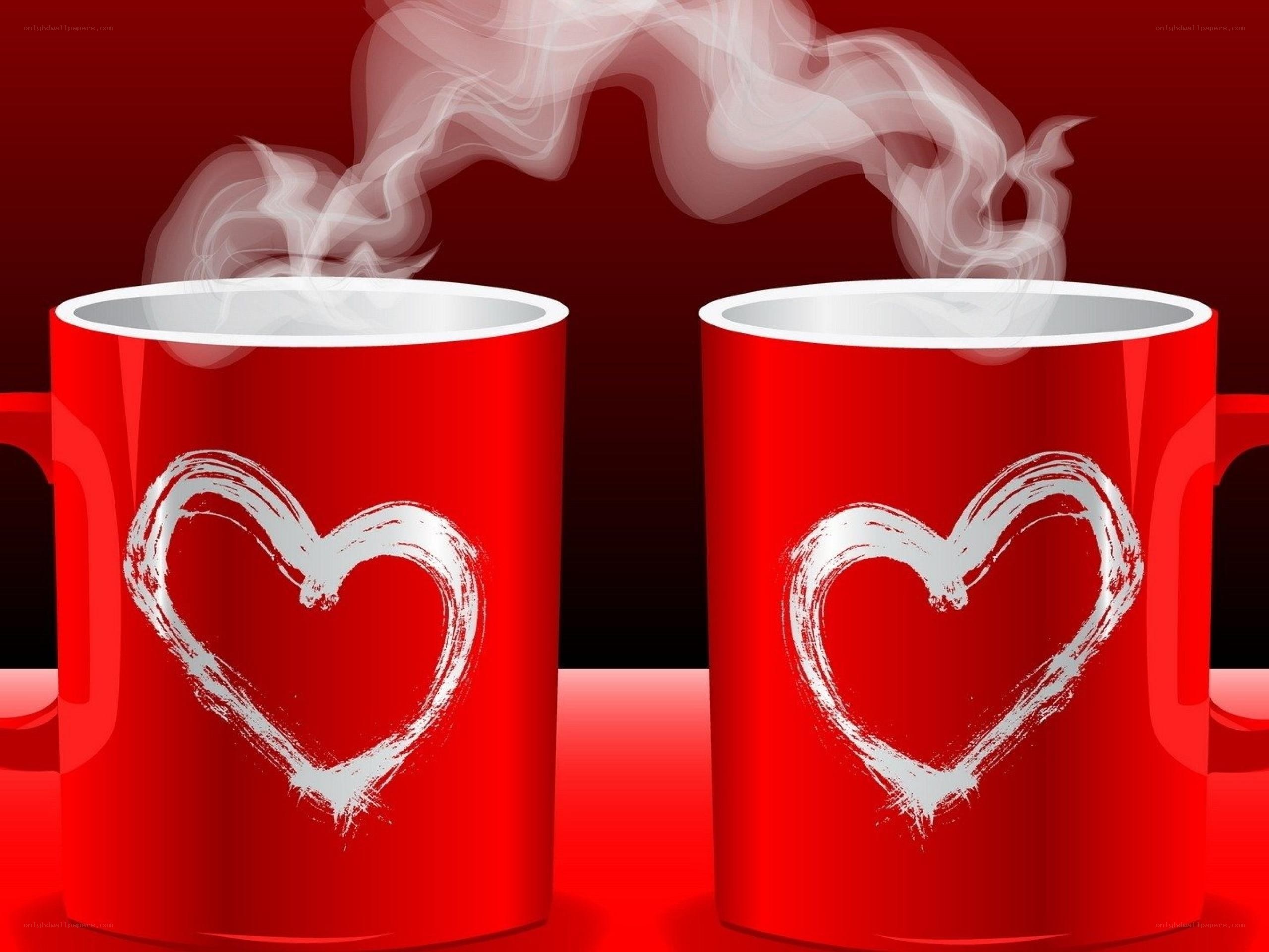 Two red mugs with hearts