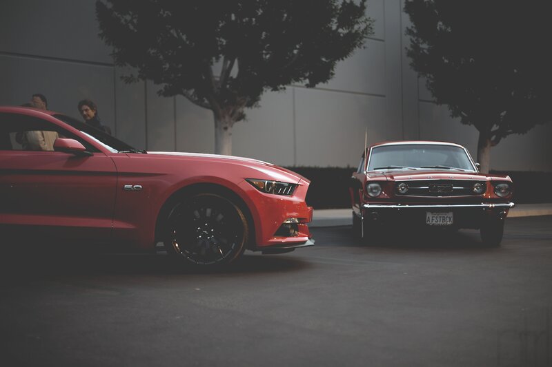 Two Red Mustang Cars