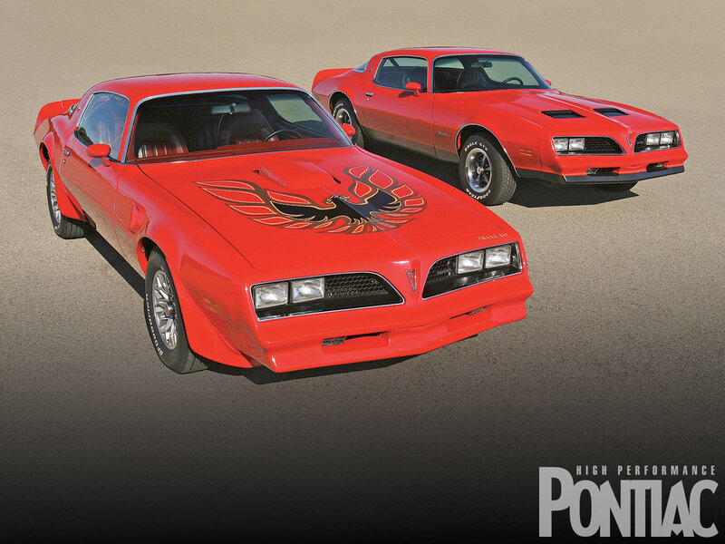 Two red Pontiac Firebirds