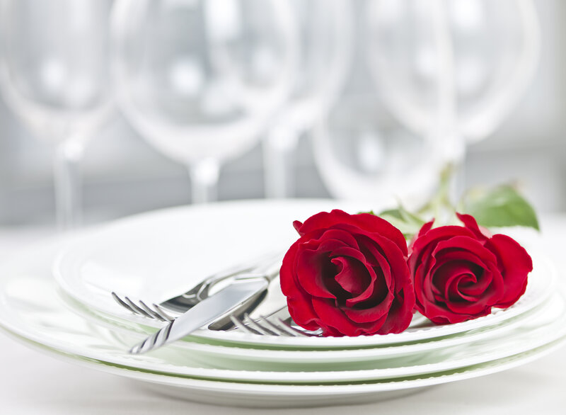 Two Red Roses on Plates