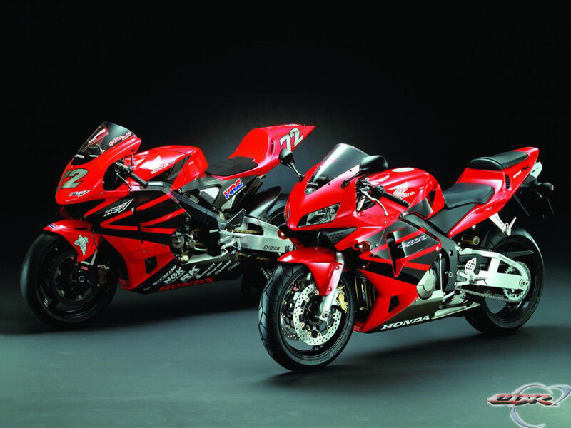 Two Red Sport Motorcycles