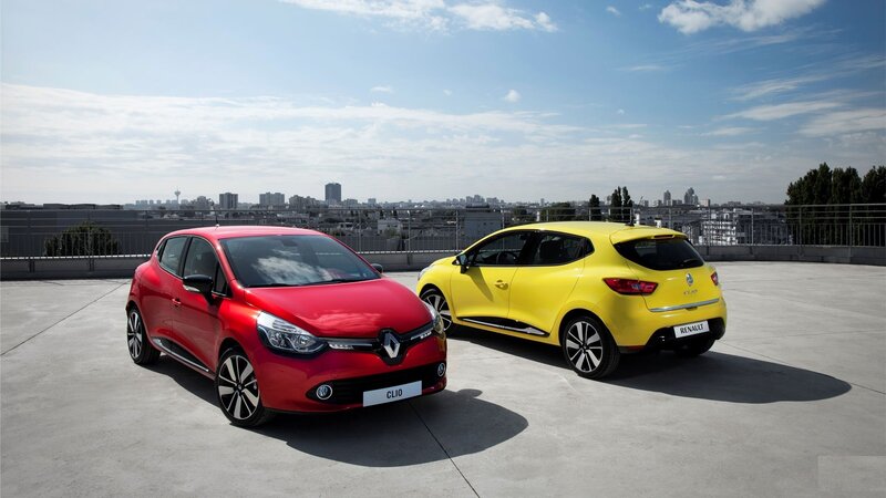 Two Renault Clio cars on a rooftop