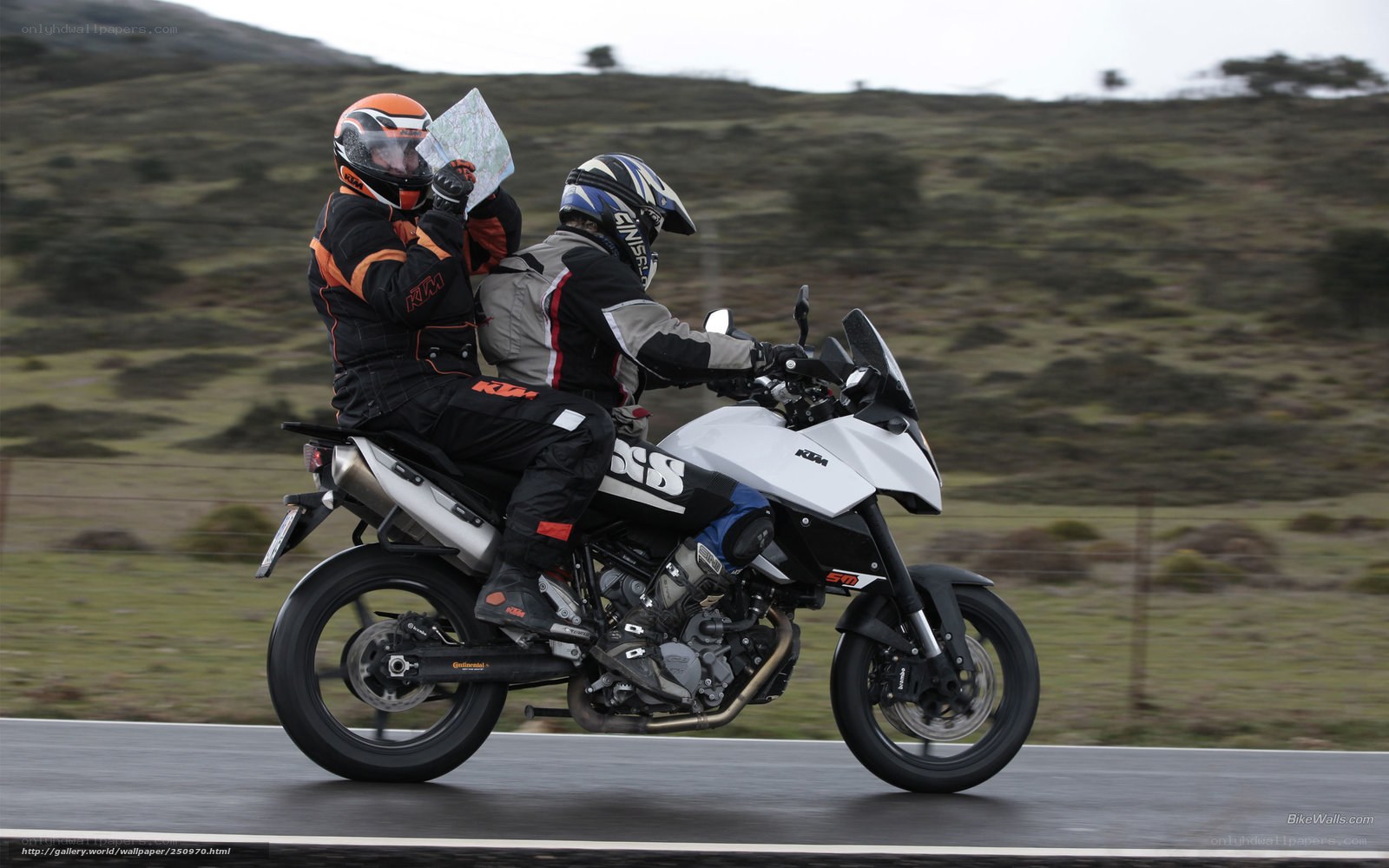 Two riders on a motorcycle