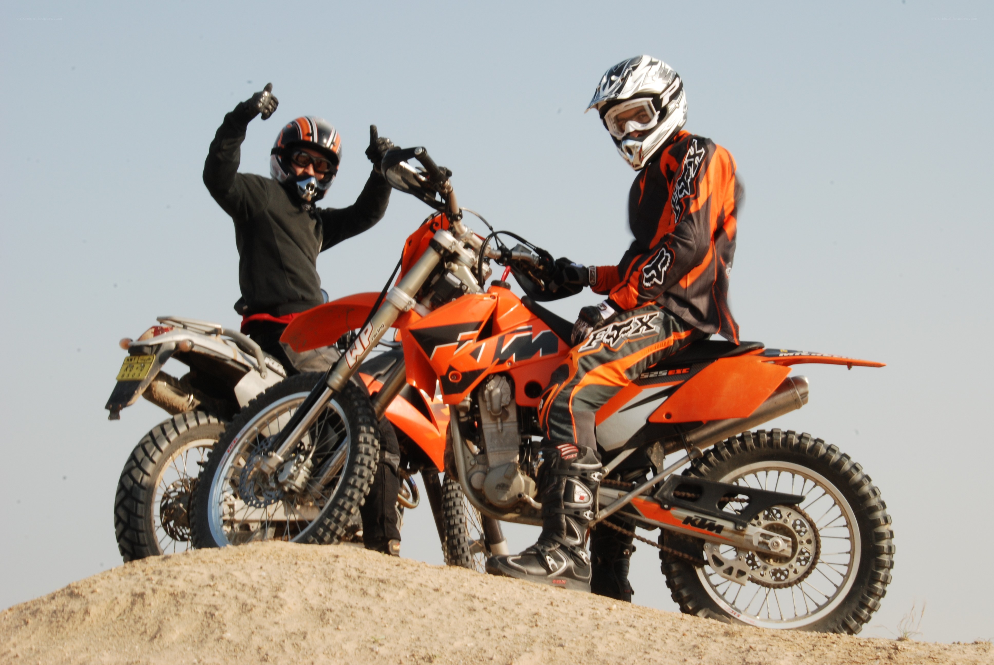 Two riders on dirt bikes