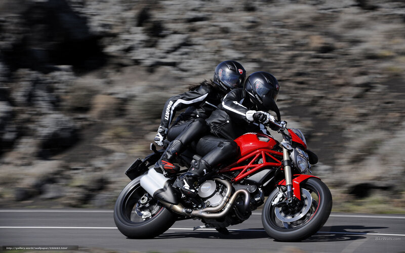 Two Riders on Red Motorcycle