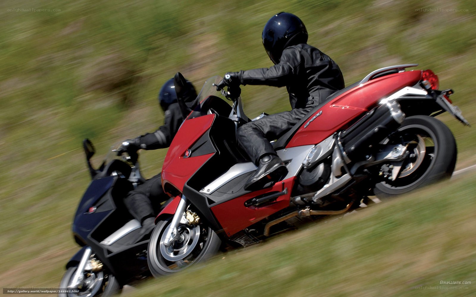 Two riders on sport motorcycles