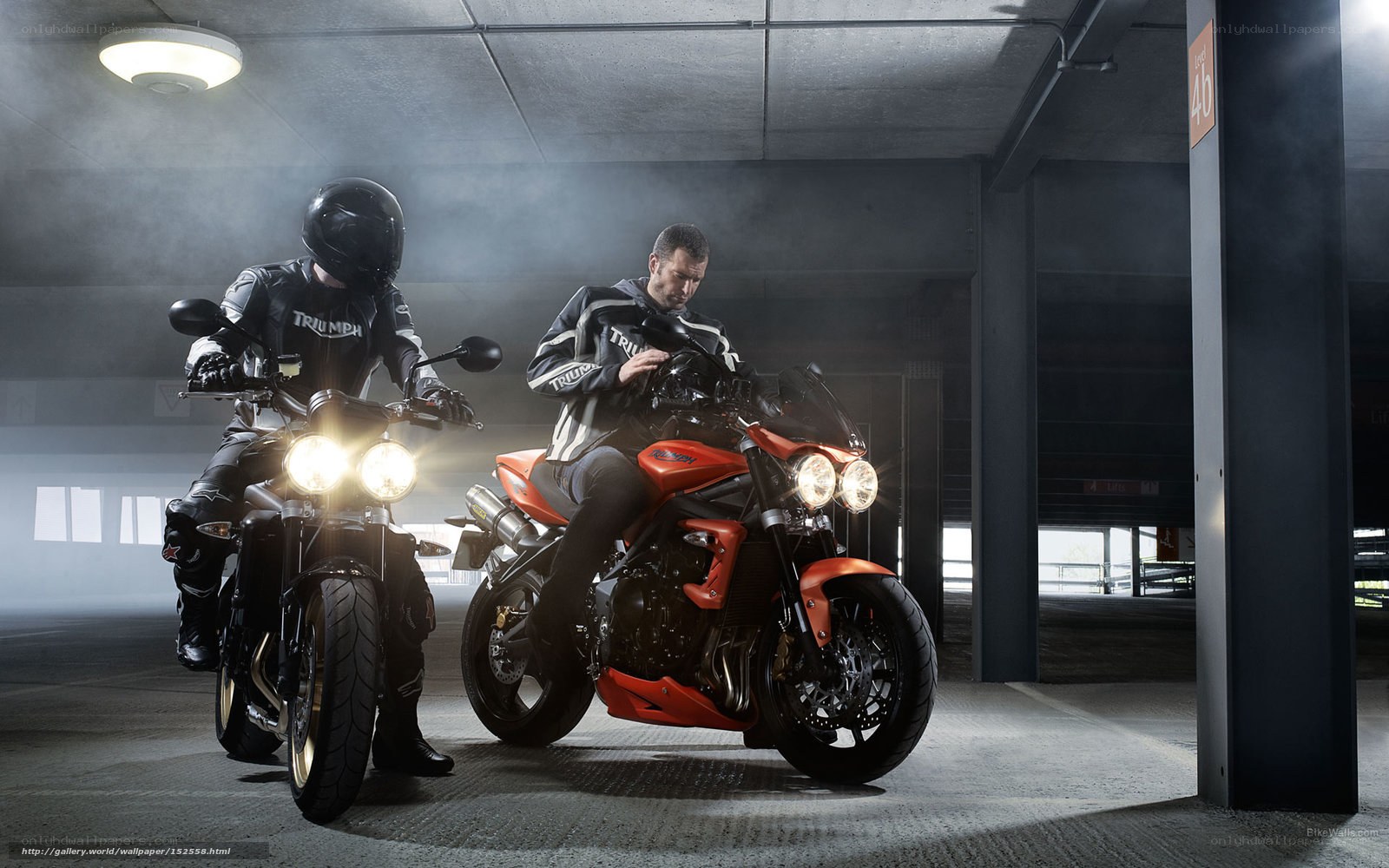 Two riders on Triumph motorcycles