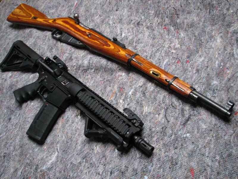 Two rifles on carpet