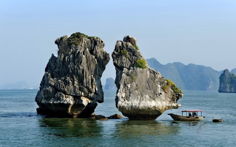 Two rock formations in a bay
