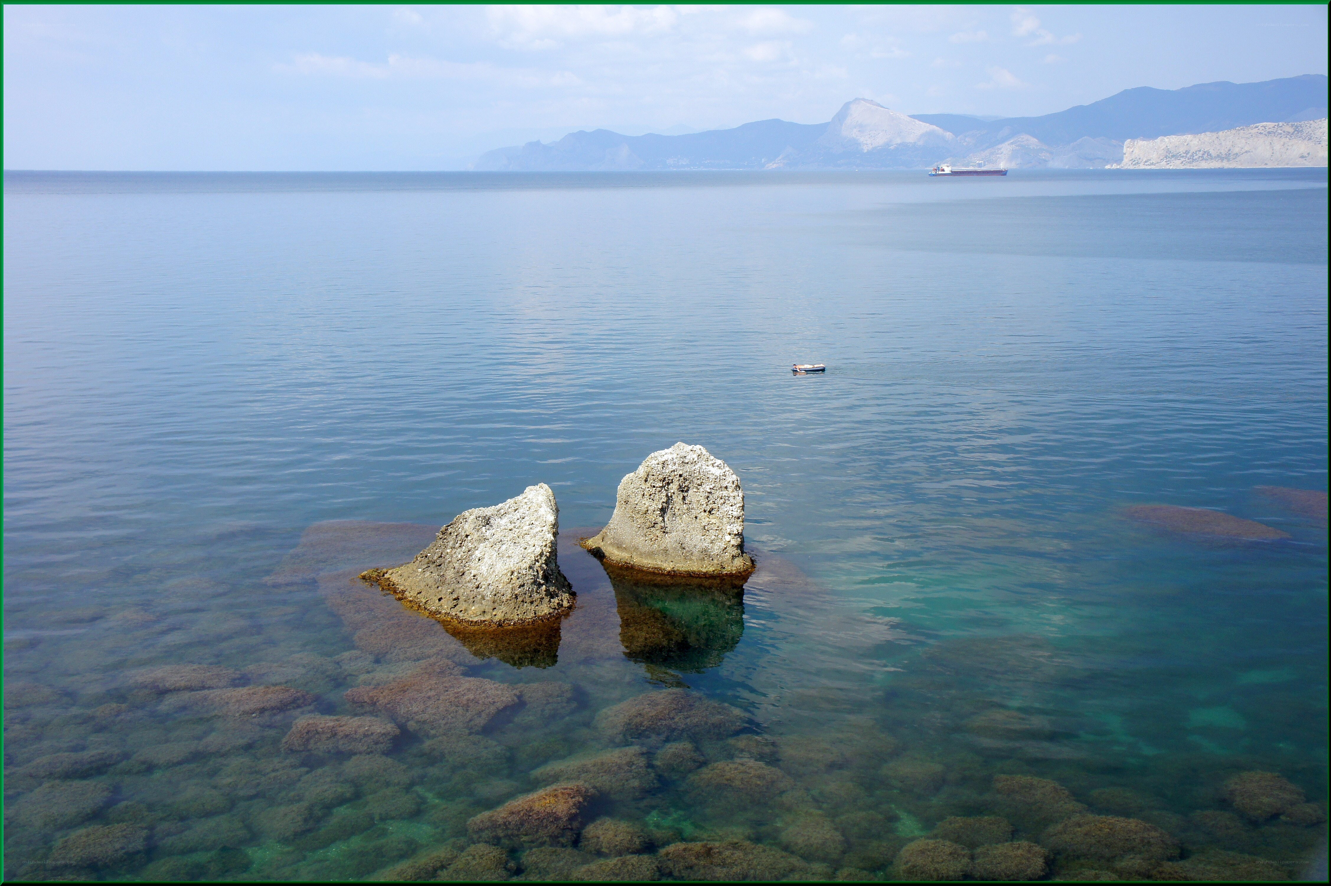 Two rocks in calm sea