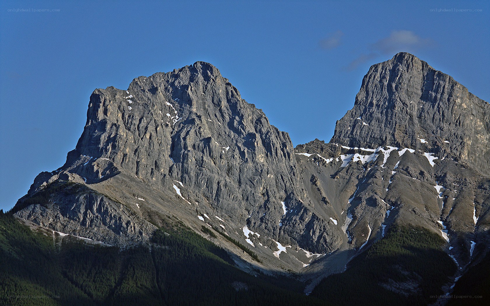 Two rugged mountain peaks