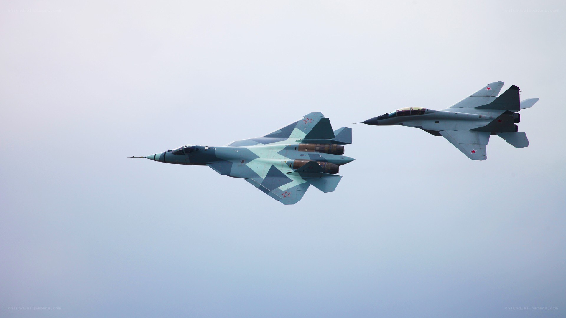 Two Russian fighter jets in flight