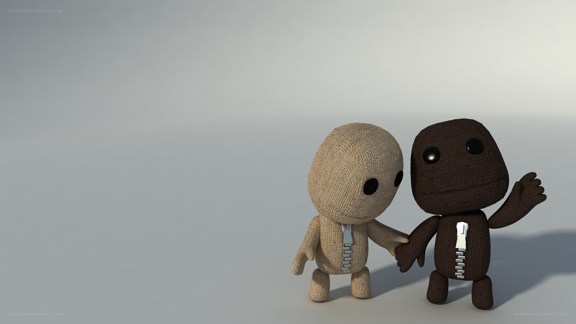 Two Sackboy characters holding hands