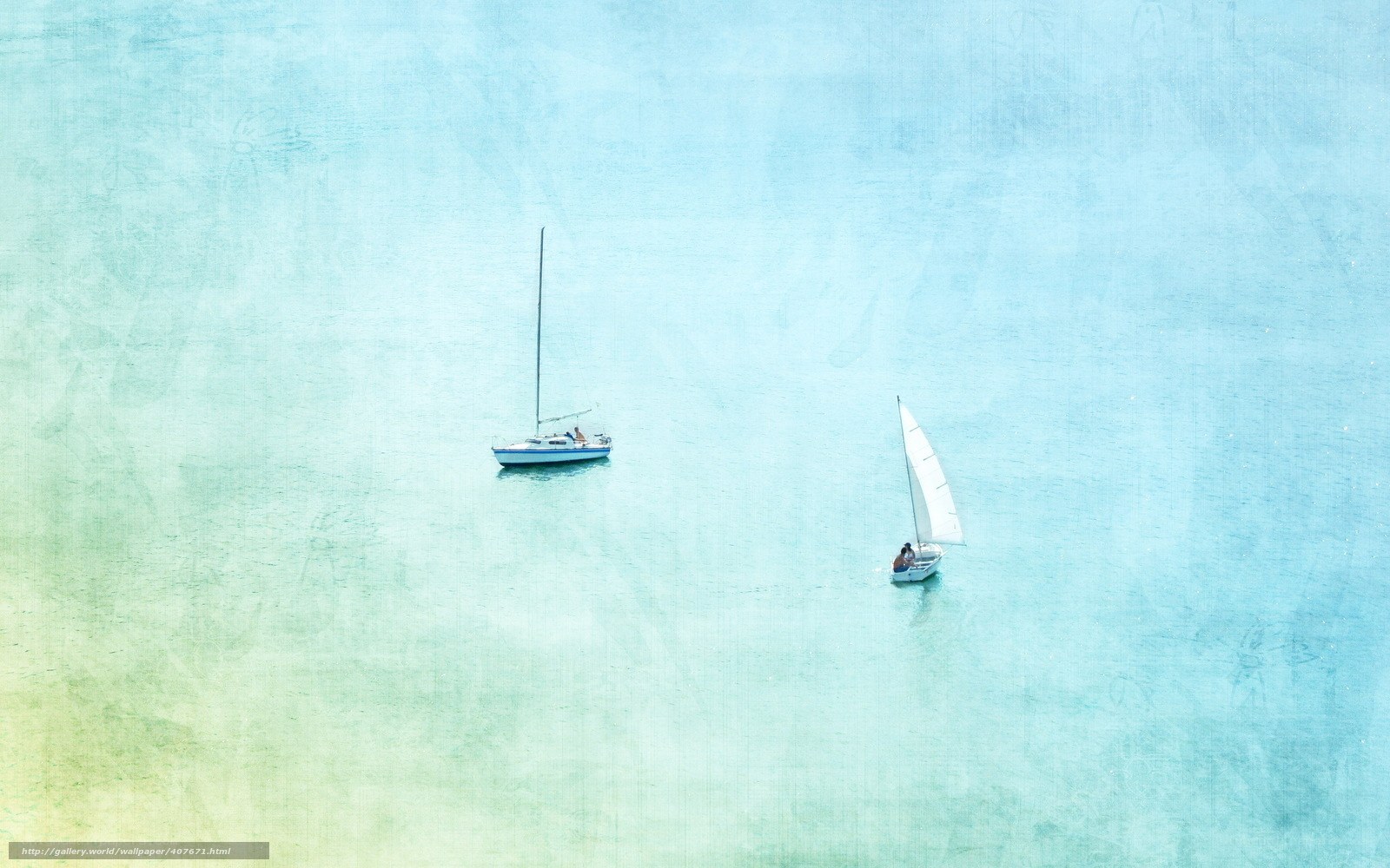 Two sailboats on calm sea
