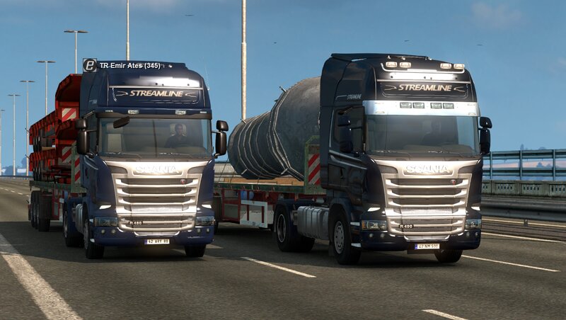 Two Scania Trucks on Highway