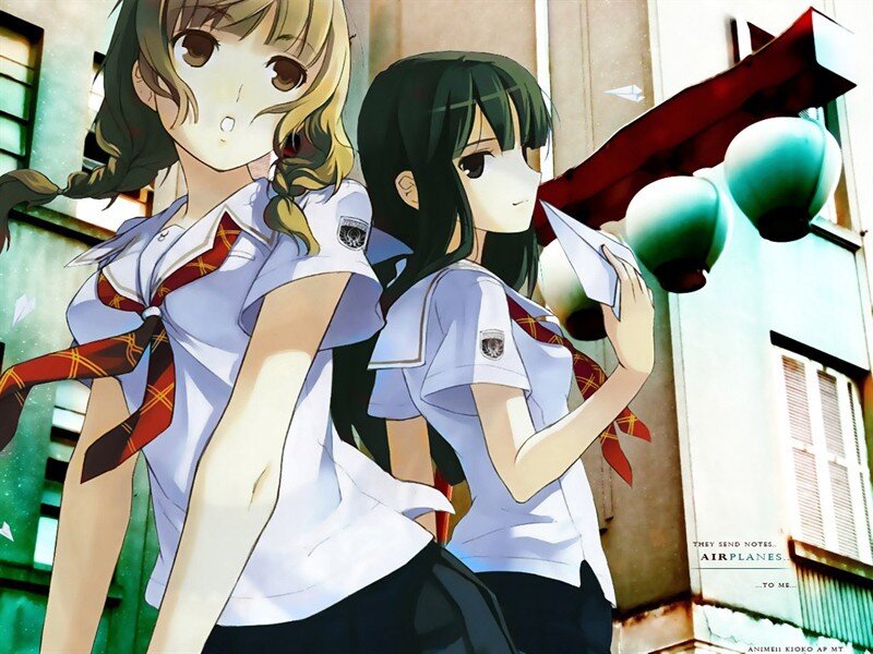 Two Schoolgirls Holding Paper Airplanes