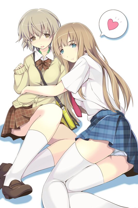 Two schoolgirls hugging