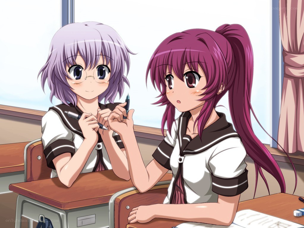 Two schoolgirls in a classroom