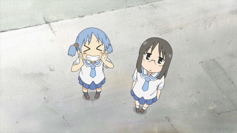 Two schoolgirls in a hallway
