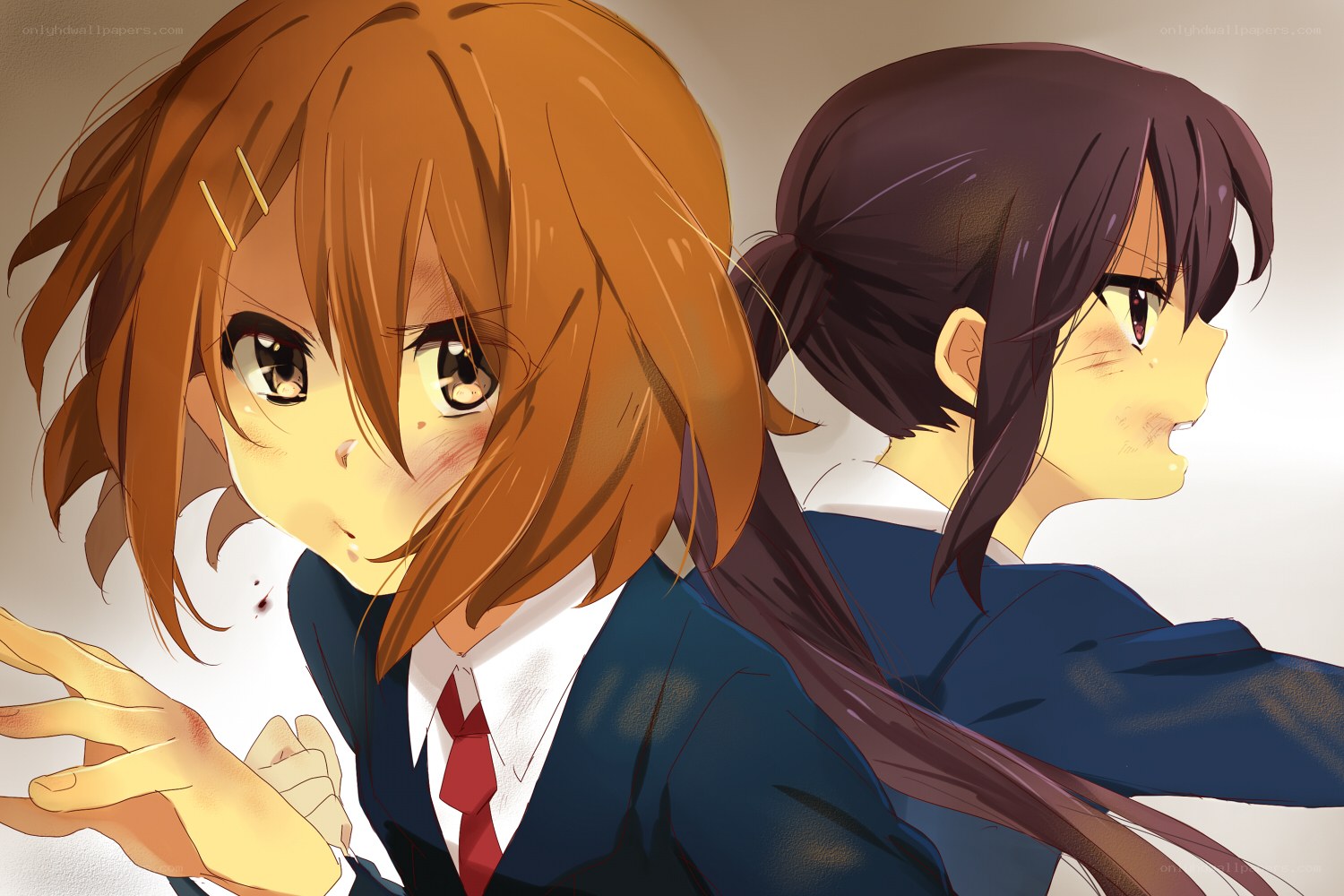 Two schoolgirls in a tense moment