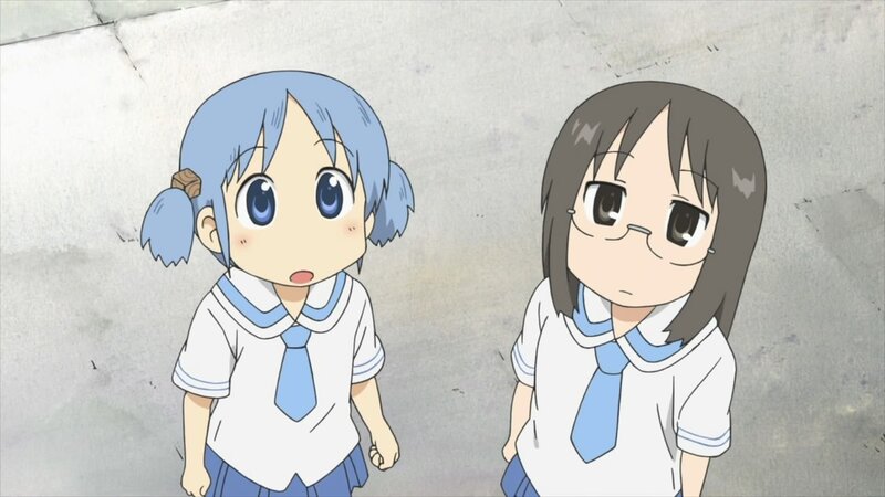 two schoolgirls in uniforms