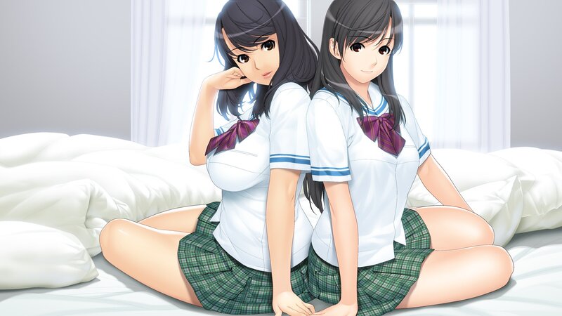 two schoolgirls on a bed