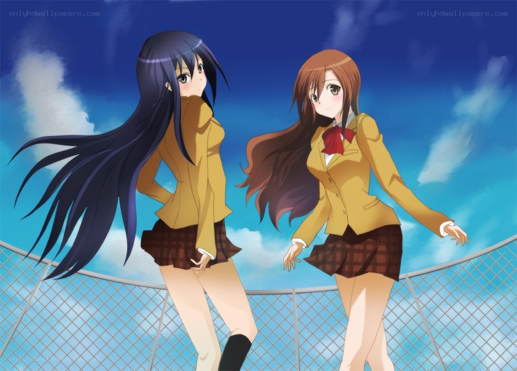 Two schoolgirls on a rooftop