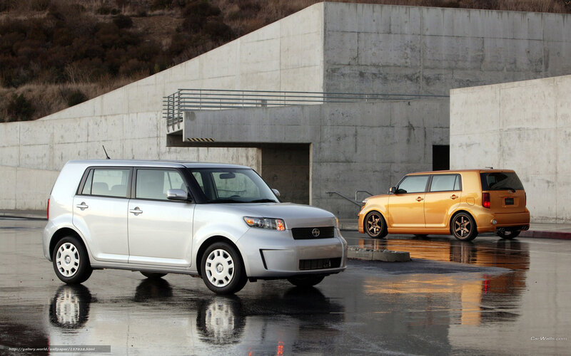 Two Scion XB Cars — Silver, Dramatic