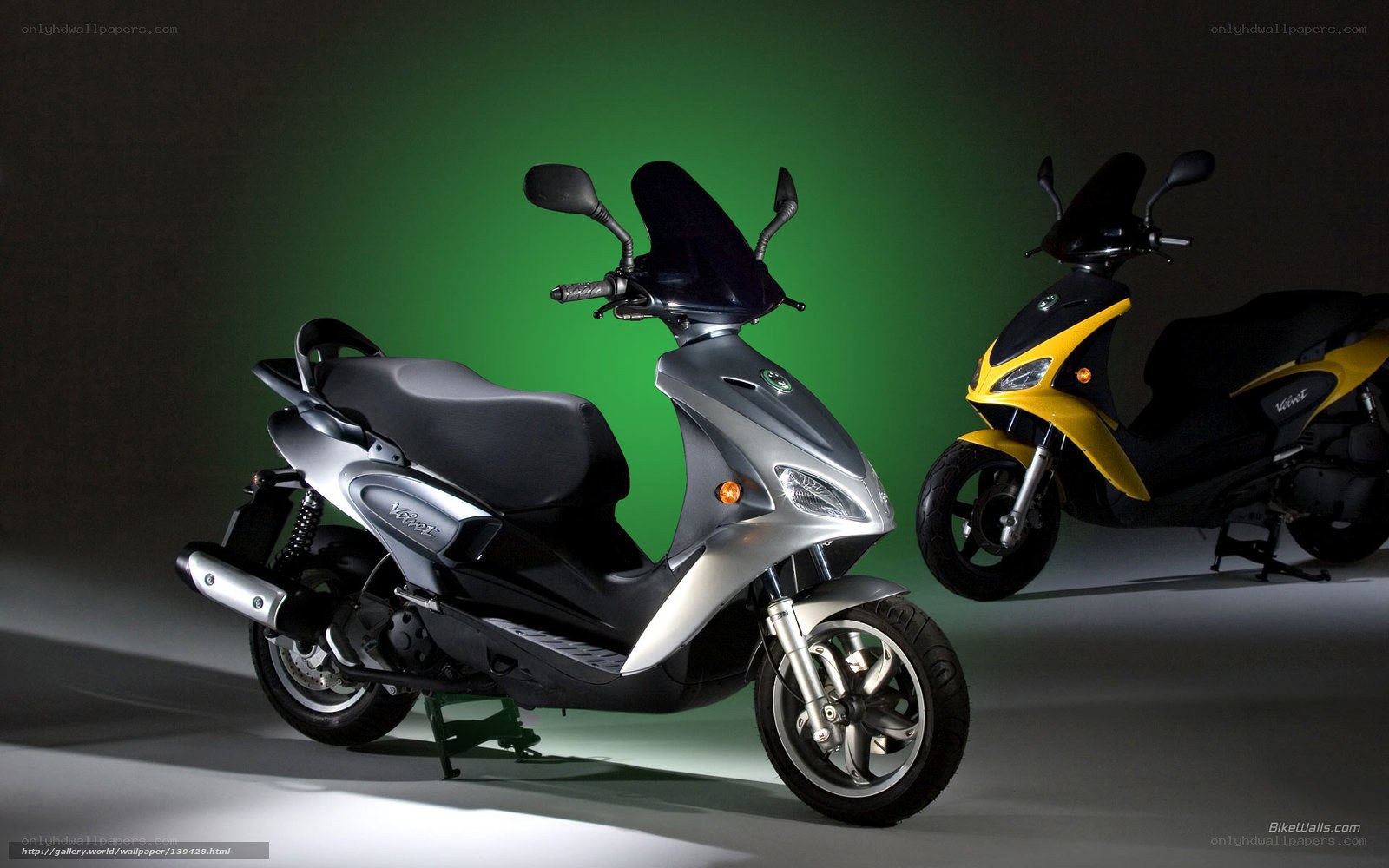 Two scooters on green background