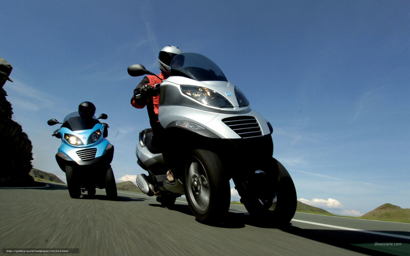 Two Scooters on Road