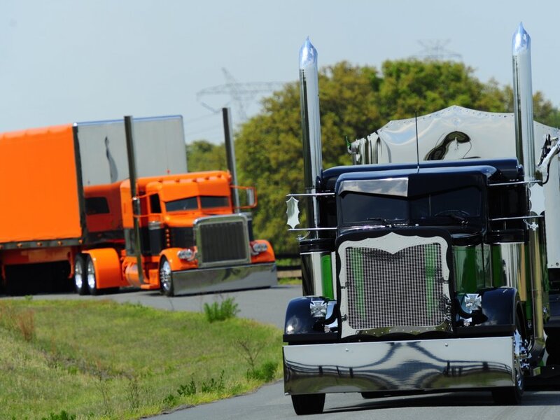 Two Semi-trucks on Road