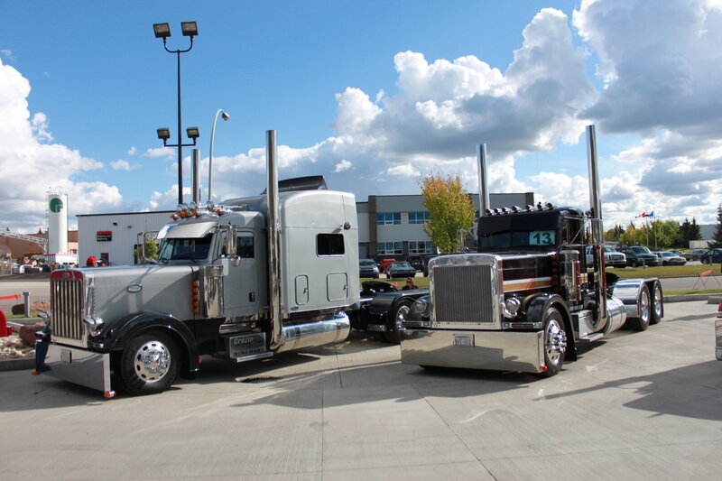 Two Semi-trucks — Silver, Outdoor