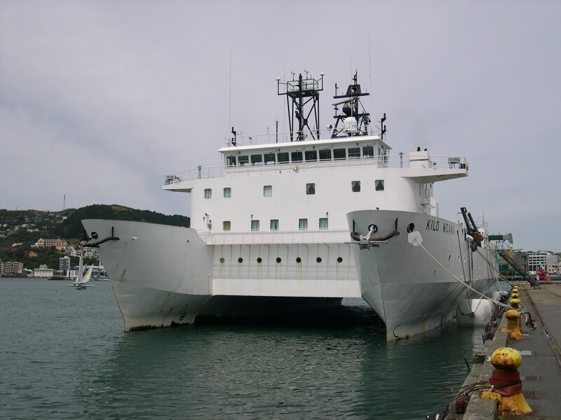 Two ships docked at a harbor