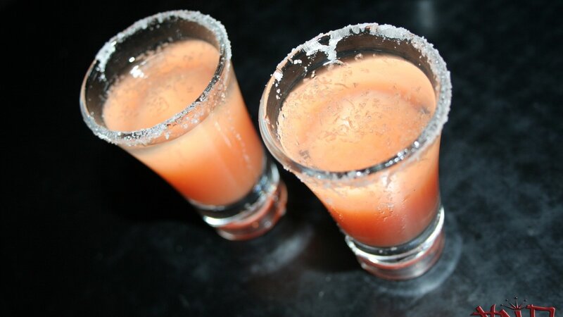 two shots of pink drink