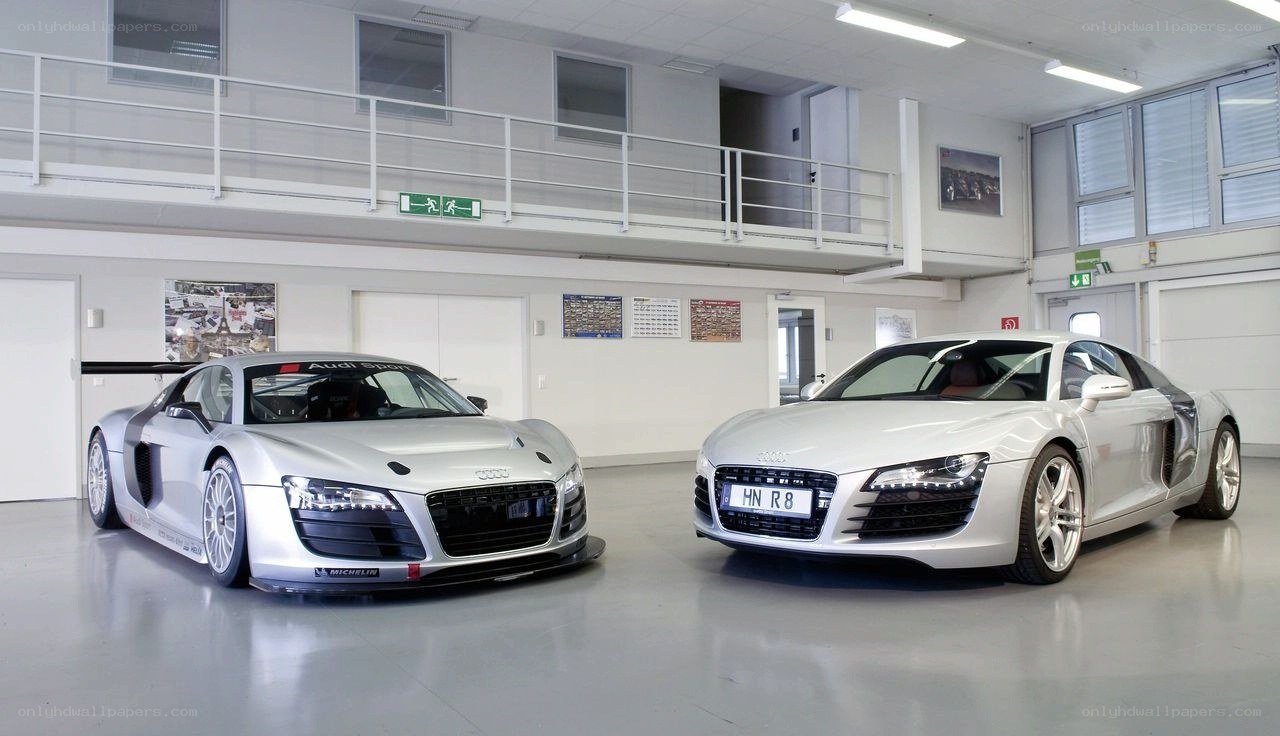 Two silver Audi R8 cars