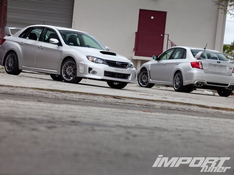 Two Silver Cars