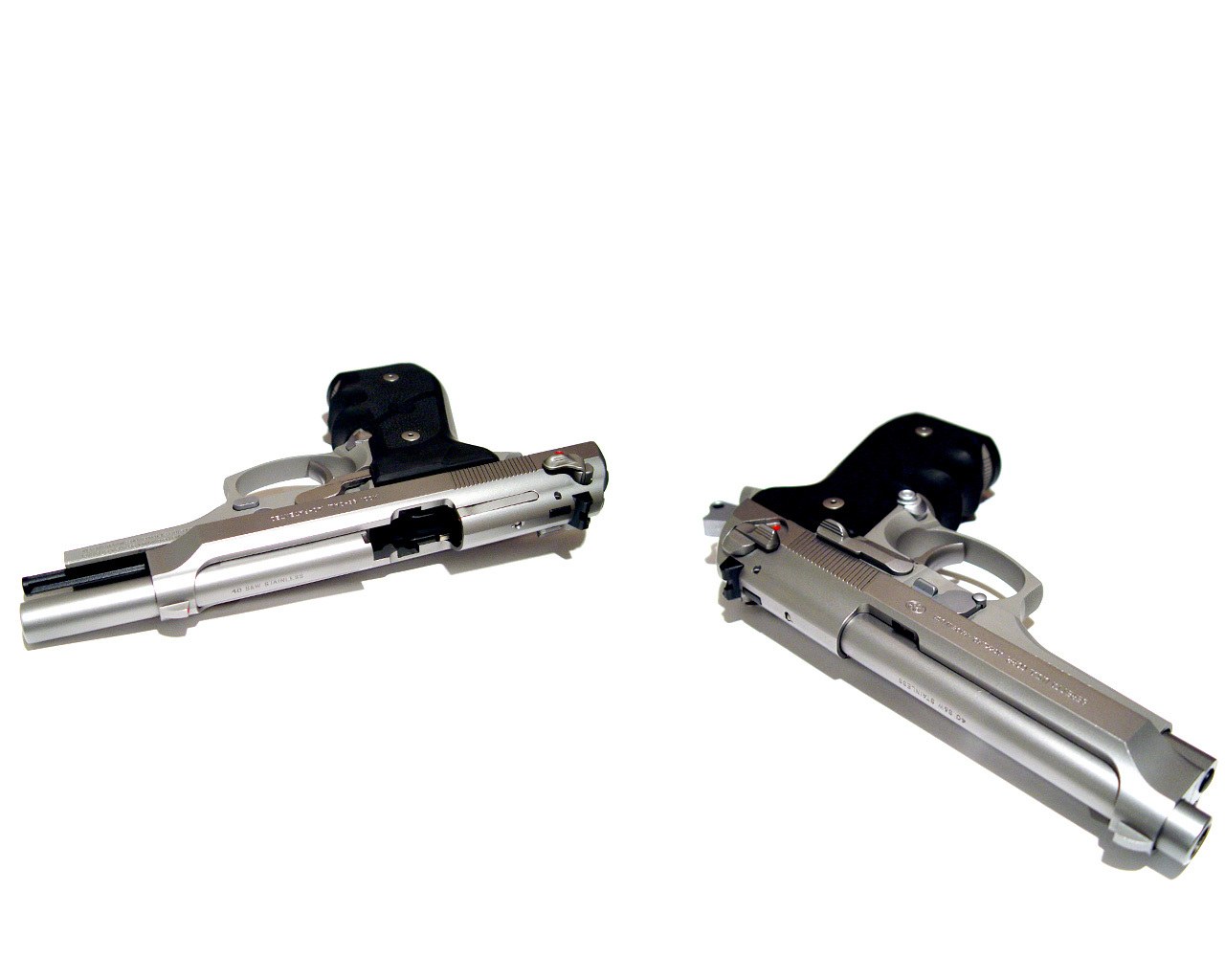 two silver handguns