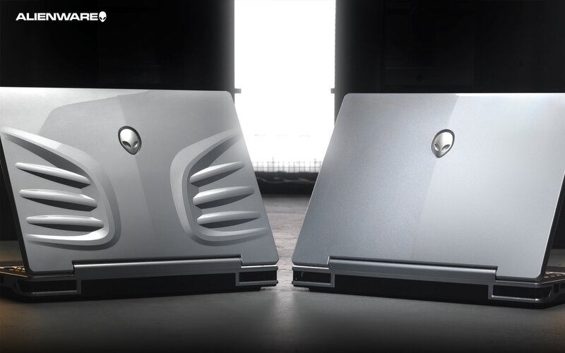 Two Silver Laptops — Dramatic