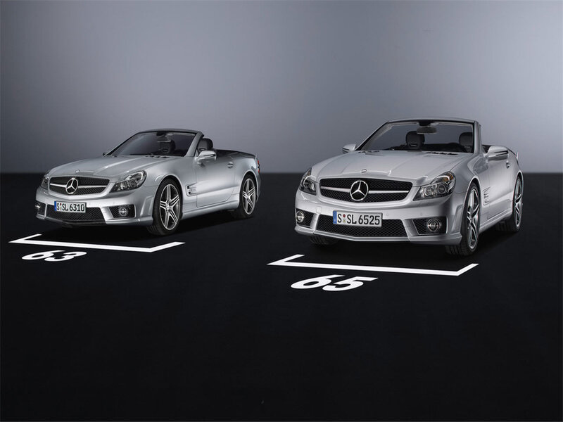 Two silver Mercedes-Benz SL convertibles
