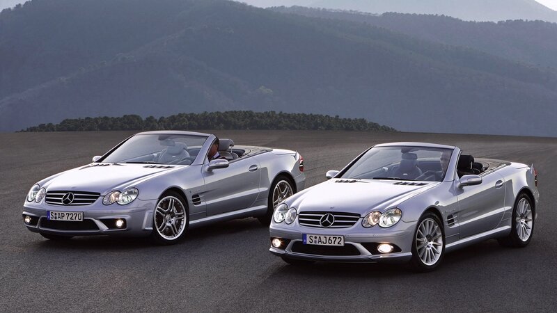 Two silver Mercedes-Benz SLK cars