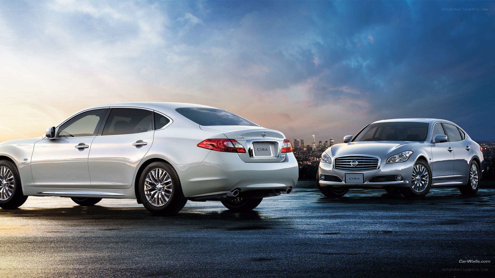 Two silver Nissan Cima sedans