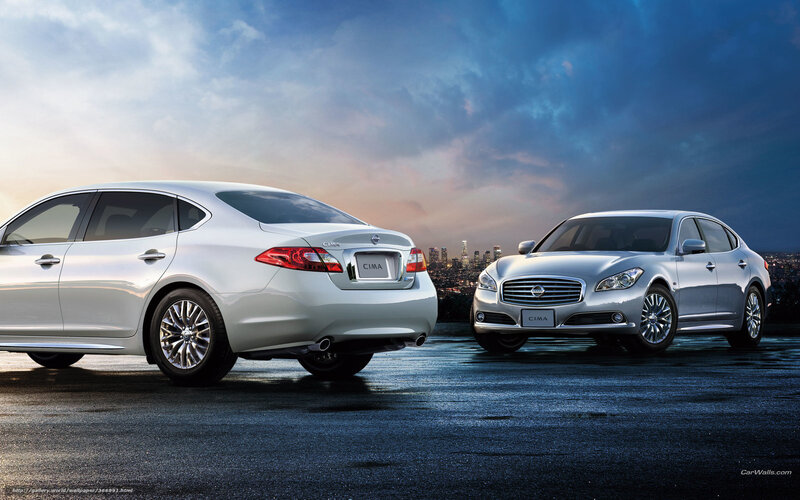 Two silver Nissan Cima sedans