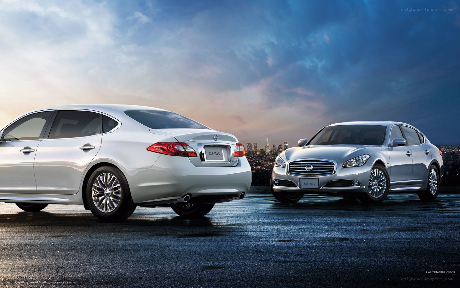 Two silver Nissan Cima sedans