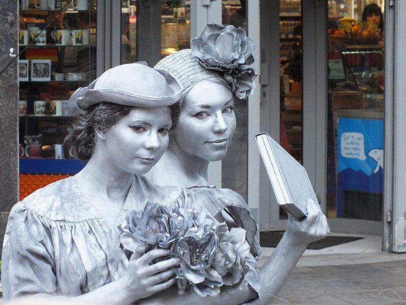 Two Silver-painted Women