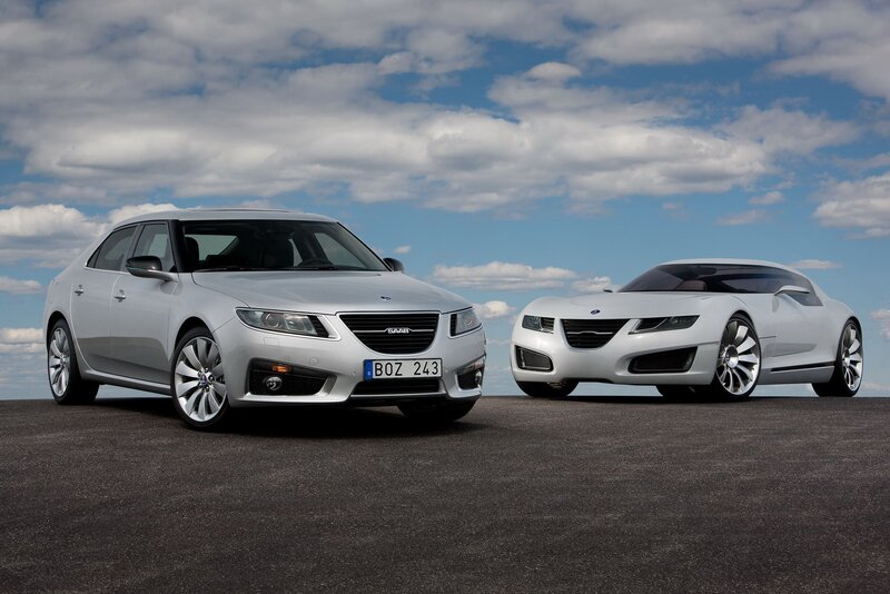 Two Silver Saab Cars — Dramatic