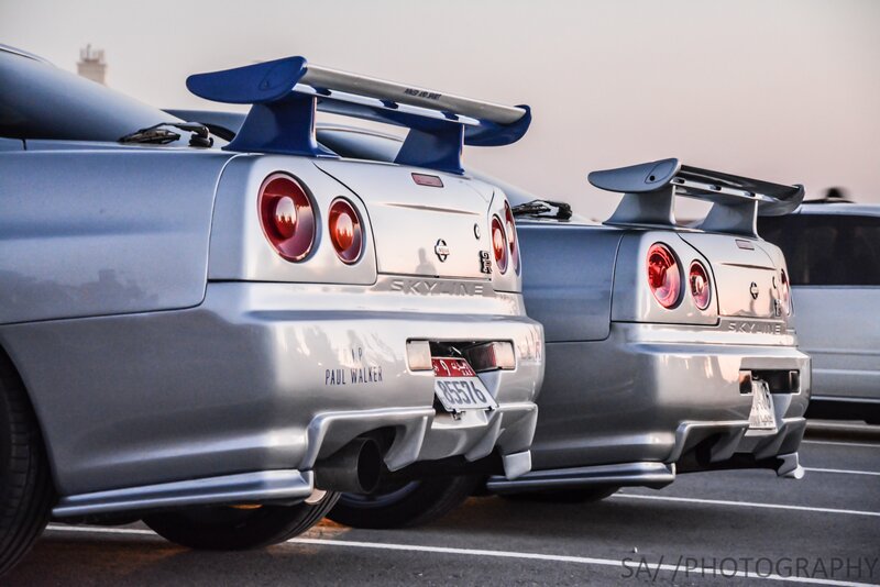 Two Silver Sports Cars — Dramatic, Sunset