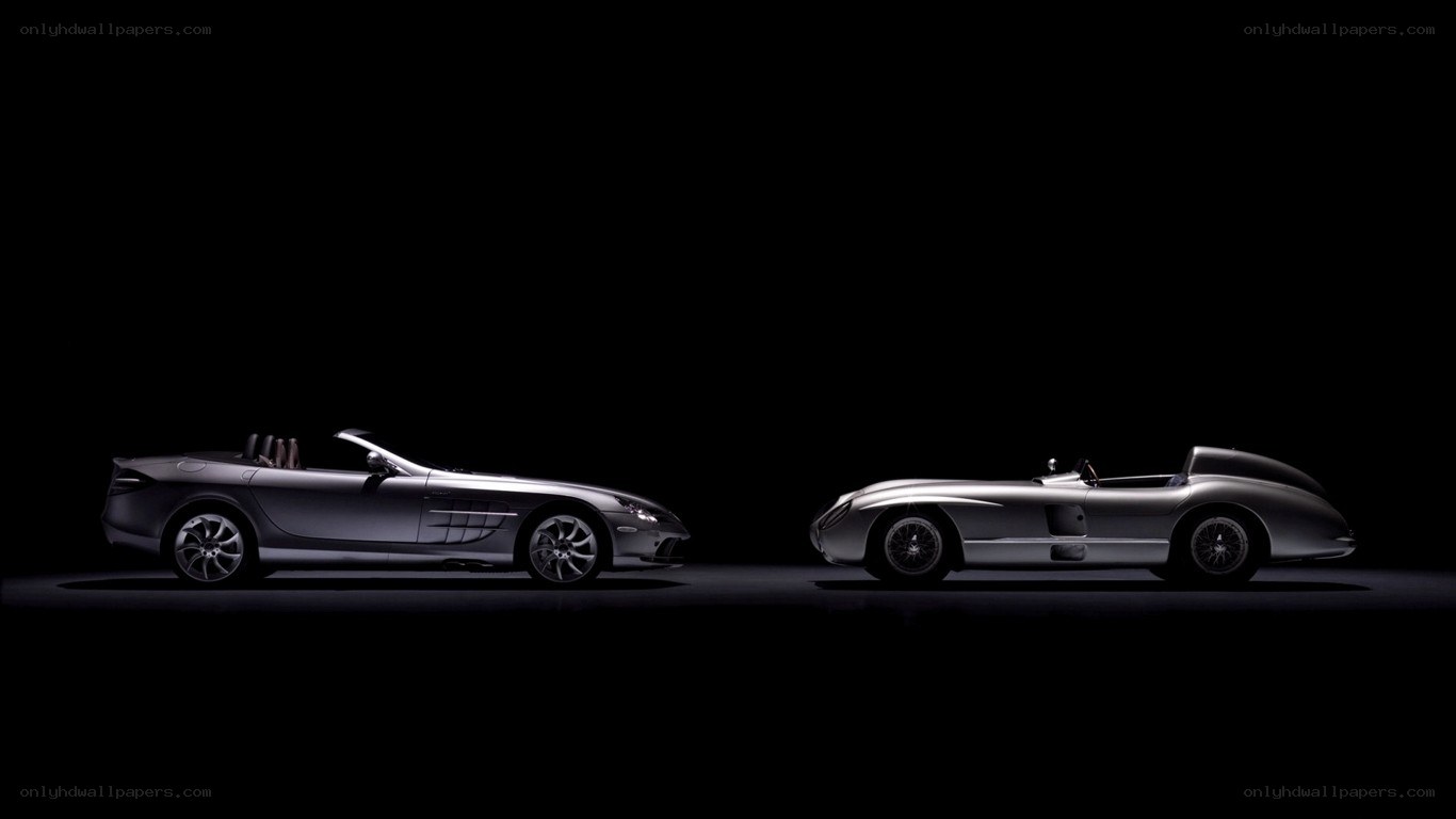 Two silver sports cars