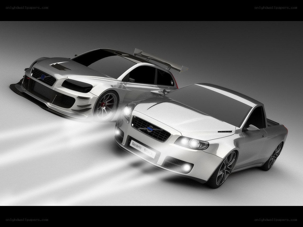Two silver Volvo concept cars